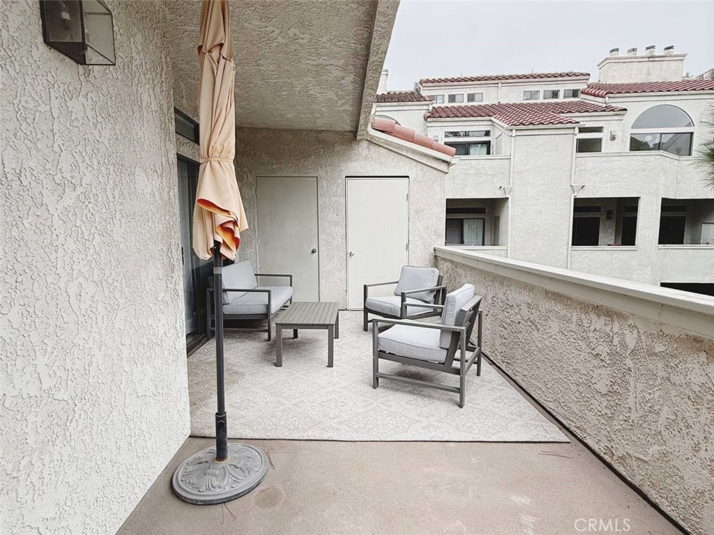 balcony - 17191 Corbina Lane 102, Huntington Beach CA 92649 - photo 25