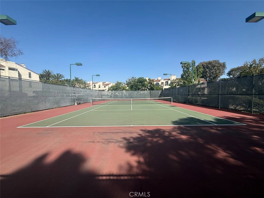 tennis court - 17191 Corbina Lane 102, Huntington Beach CA 92649 - photo 28