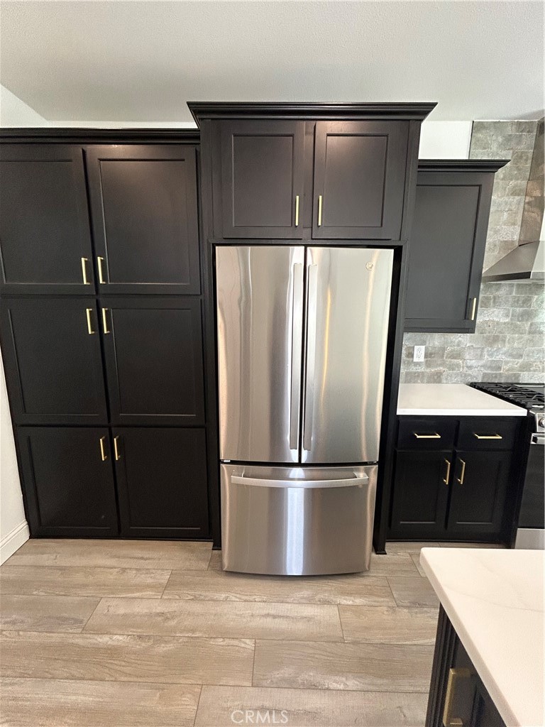 stainless steel refrigerator, built in cabinets - 17261 Gothard Street 13, Huntington Beach CA 92647 - photo 7