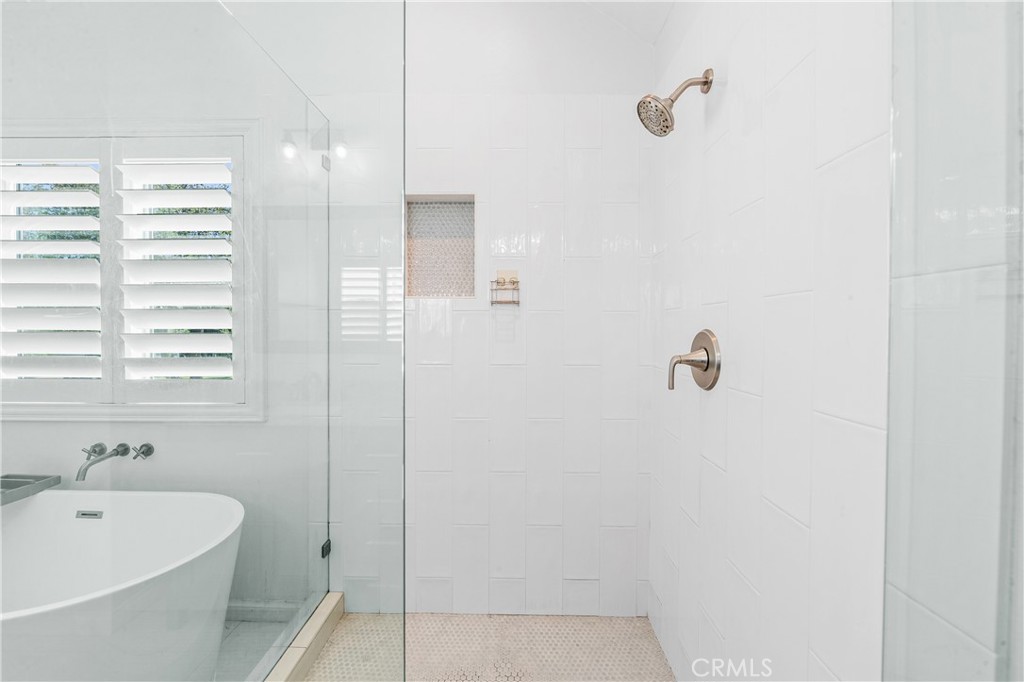 Contemporary bathroom featuring a clean, bright design and glass shower enclosure. - 17327 Apel Lane, Huntington Beach CA 92649 - photo 31