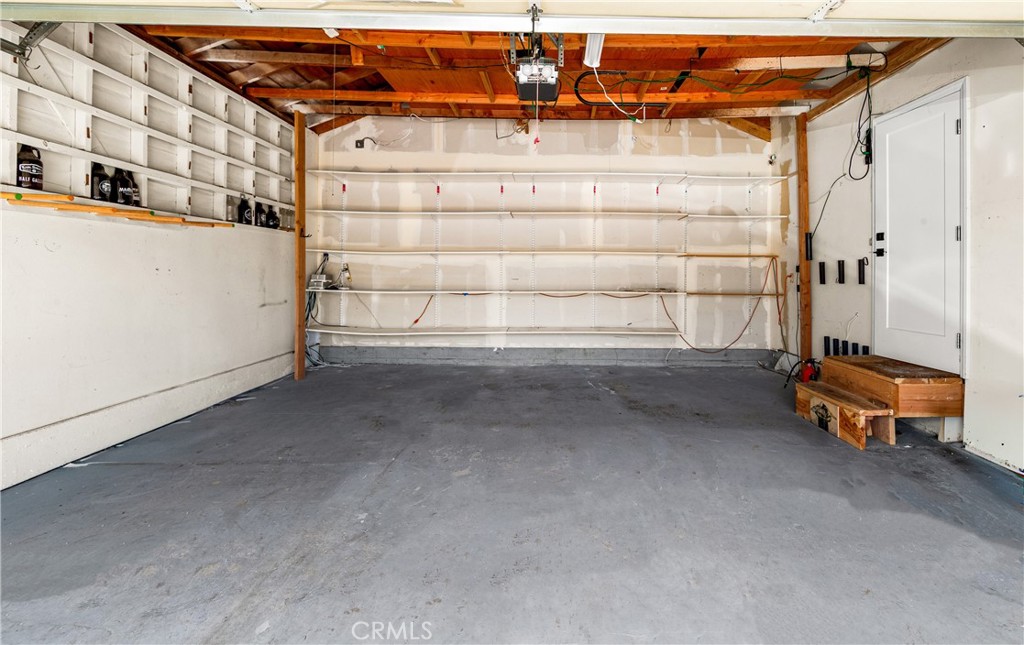 Bright covered patio with exposed wood-beam detail and direct access to the backyard. - 17327 Apel Lane, Huntington Beach CA 92649 - photo 58