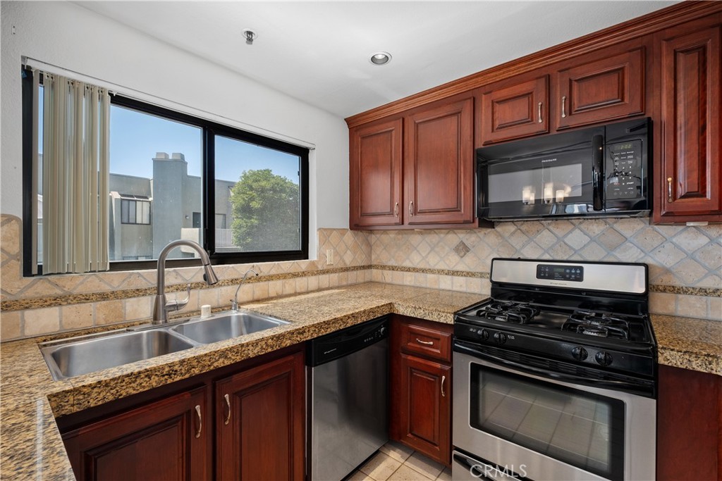 17652 Sergio Circle 202, Huntington Beach CA 92647 - photo 1