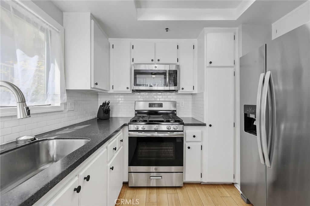 17702 Sergio Circle 102, Huntington Beach CA 92647 - photo 1