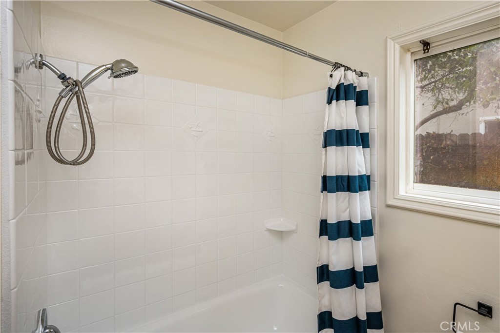 Guest bath with tub shower combo - 17751 Lewis, Huntington Beach CA 92647 - photo 46