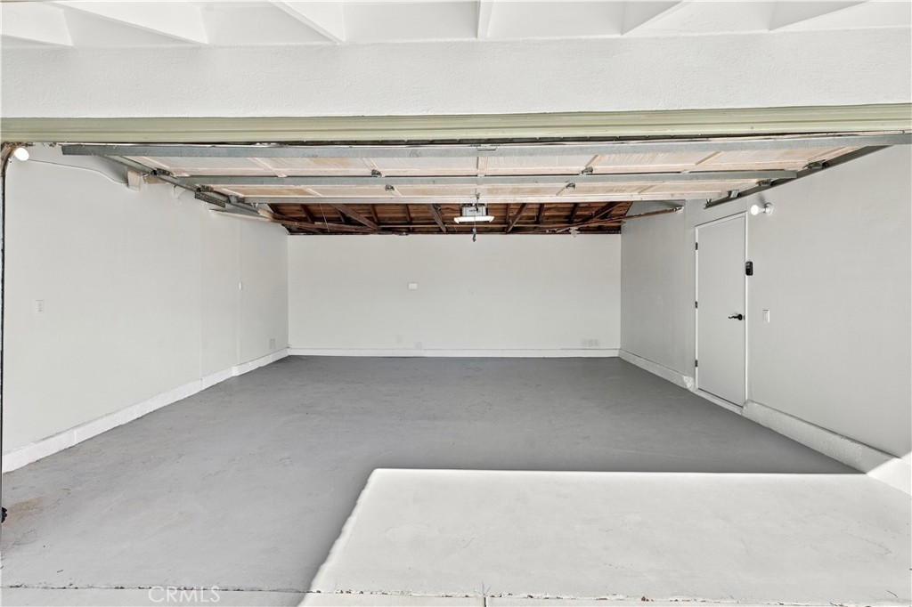 Garage interior - 17781 Flintstone Lane, Huntington Beach CA 92647 - photo 27
