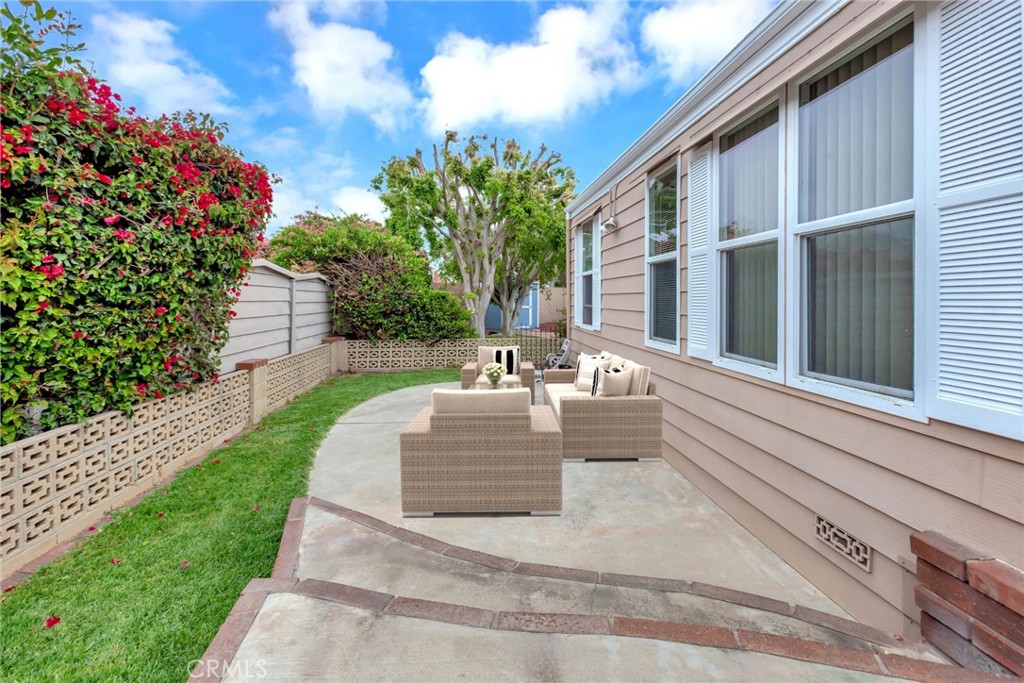 Side yard - 18601 Newland Street 89, Huntington Beach CA 92646 - photo 22
