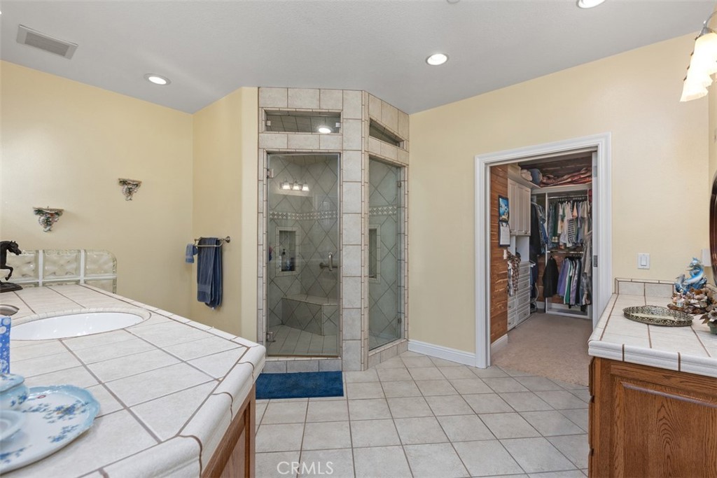 The shower is also a sauna - 18732 Jockey Circle, Huntington Beach CA 92648 - photo 30