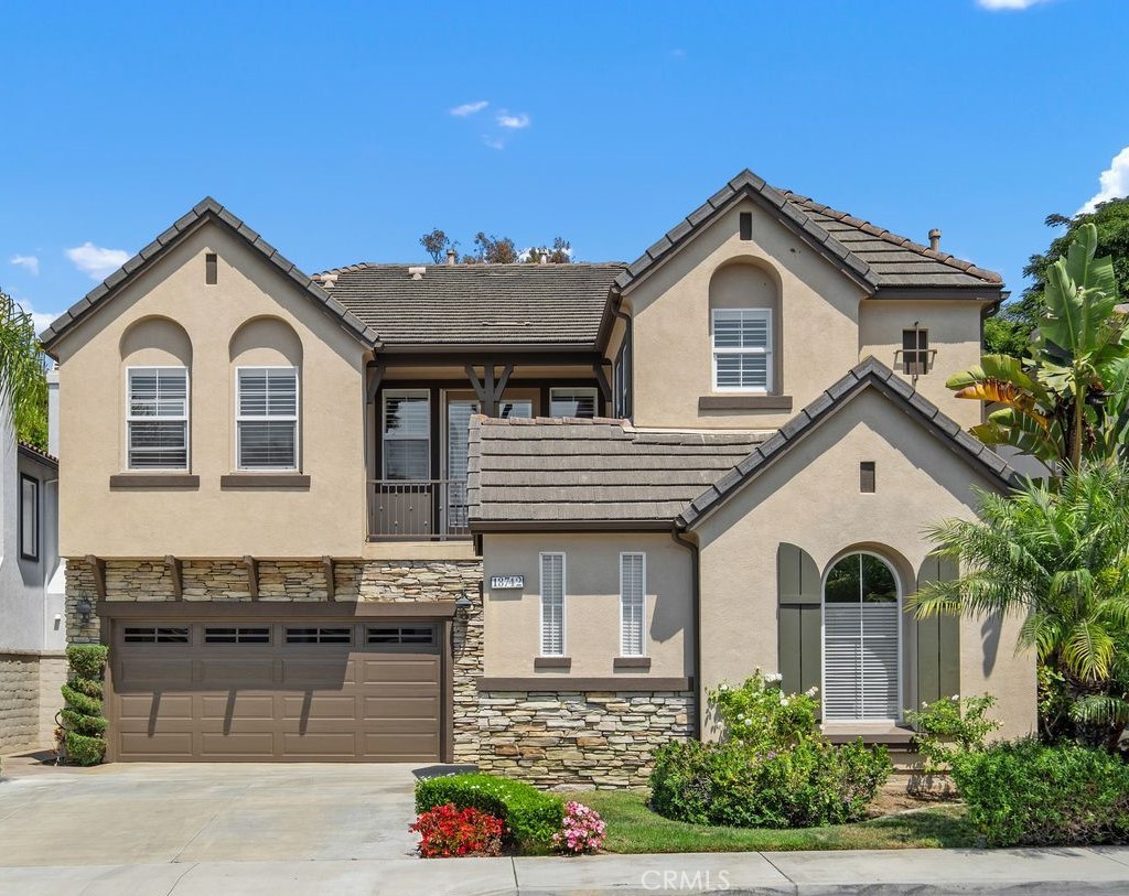 Tucked within a serene enclave of the prestigious and gated Crystalaire community, this beautifully appointed 4 bedroom - 18742 Calera Lane, Huntington Beach CA 92648 - photo 1