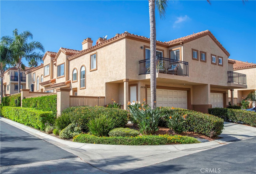 Corner unit on a cul-de-sac, across the street from the pool. - 18859 Milos Circle, Huntington Beach CA 92648 - photo 1