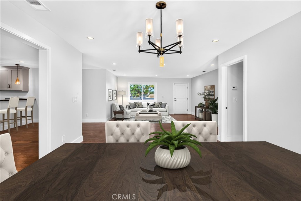 Living/dining room. Virtual staging. - 19352 Brookhurst, Huntington Beach CA 92646 - photo 4
