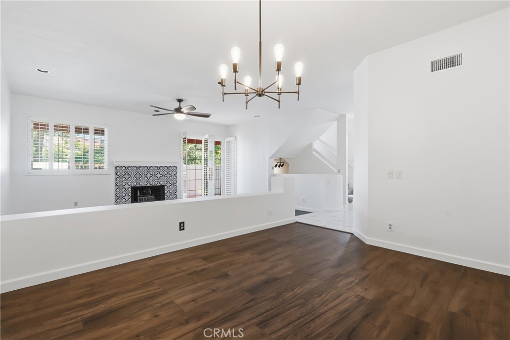 Formal dining room off the living room - 19481 Pompano Lane 112, Huntington Beach CA 92648 - photo 8