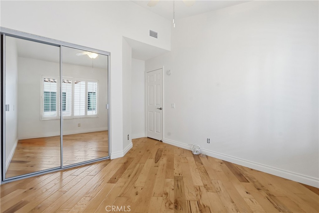 Upper additional bedroom 1 - 19481 Pompano Lane 112, Huntington Beach CA 92648 - photo 16