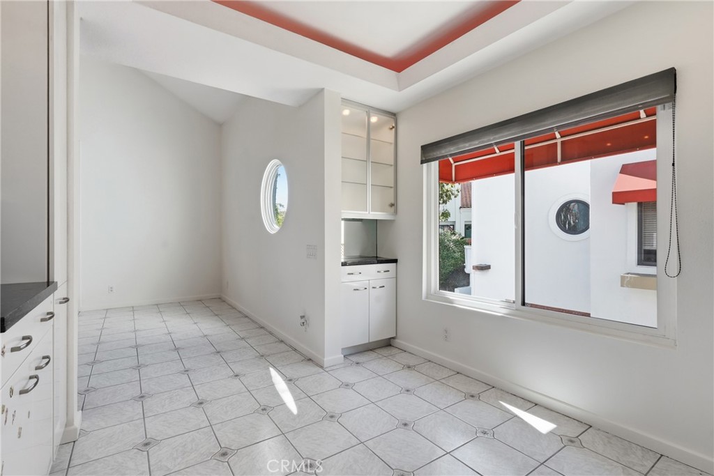 Extended kitchen space and breakfast area - 19481 Pompano Lane 112, Huntington Beach CA 92648 - photo 21