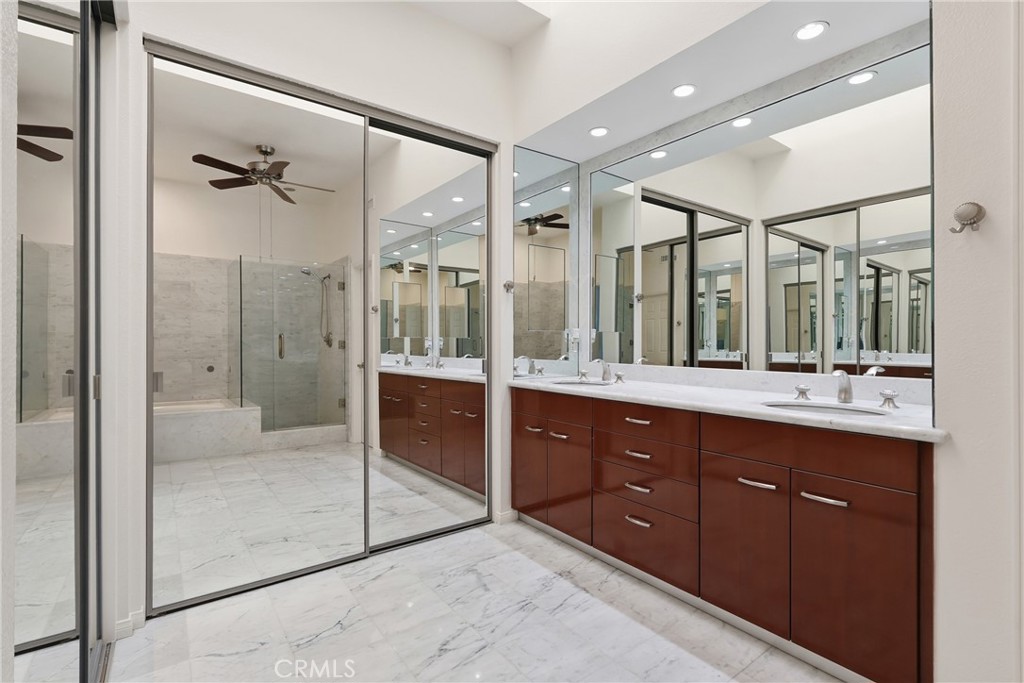 Primary bathroom with double vanity - 19481 Pompano Lane 112, Huntington Beach CA 92648 - photo 24