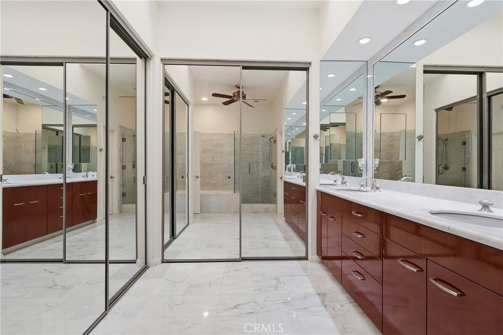 Primary bathroom with double vanity - 19481 Pompano Lane 112, Huntington Beach CA 92648 - photo 25