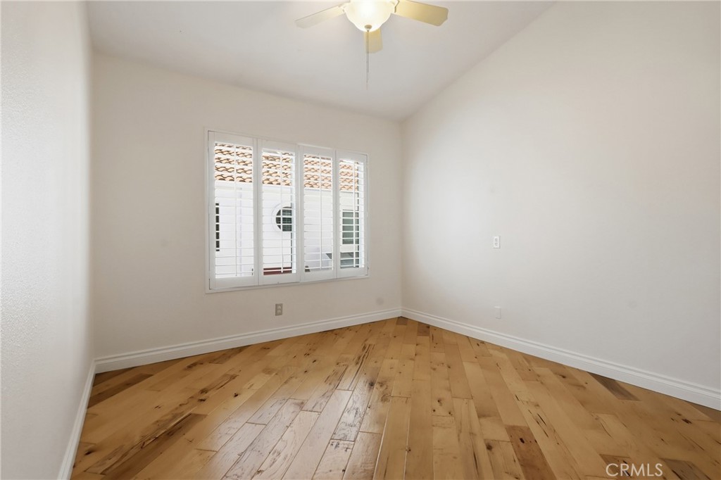 Upper additional bedroom 1 - 19481 Pompano Lane 112, Huntington Beach CA 92648 - photo 29