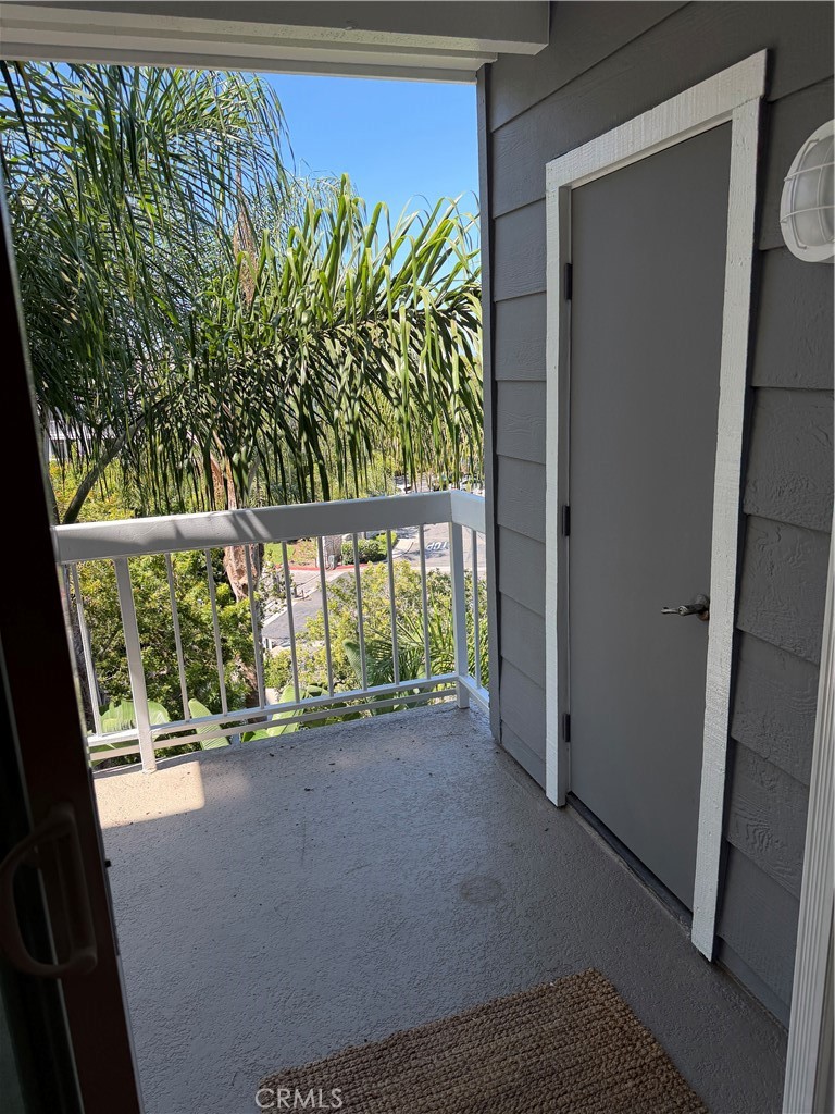 Attached balcony with large closet fits 9' long board or bikes - 20331 Bluffside 309, Huntington Beach CA 92646 - photo 14