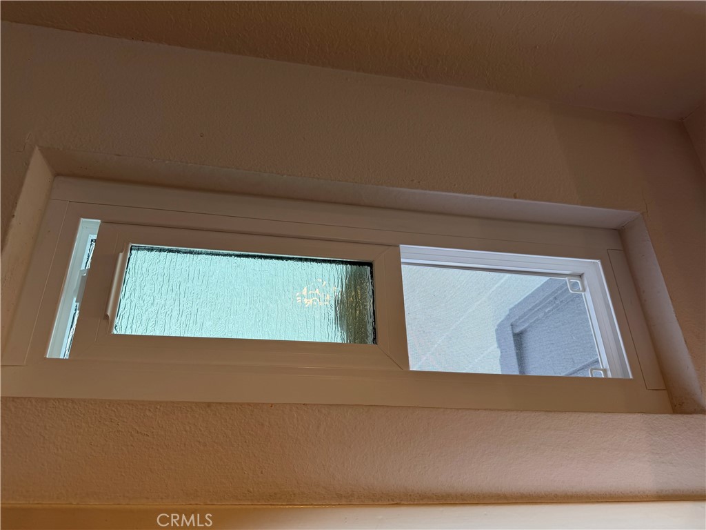 New dual pane transom for afternoon ocean breeze - 20331 Bluffside 309, Huntington Beach CA 92646 - photo 18