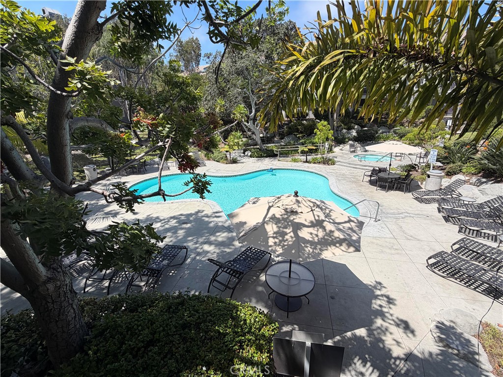 Pool in complex with lagoon and babbling brook - 20331 Bluffside 309, Huntington Beach CA 92646 - photo 21