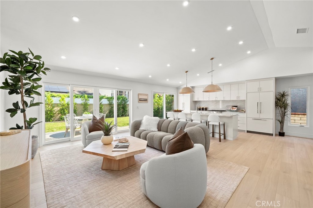 Great room incorporates living room, gourmet kitchen, and elegant dining room together - 20852 Farnsworth Lane, Huntington Beach CA 92646 - photo 3