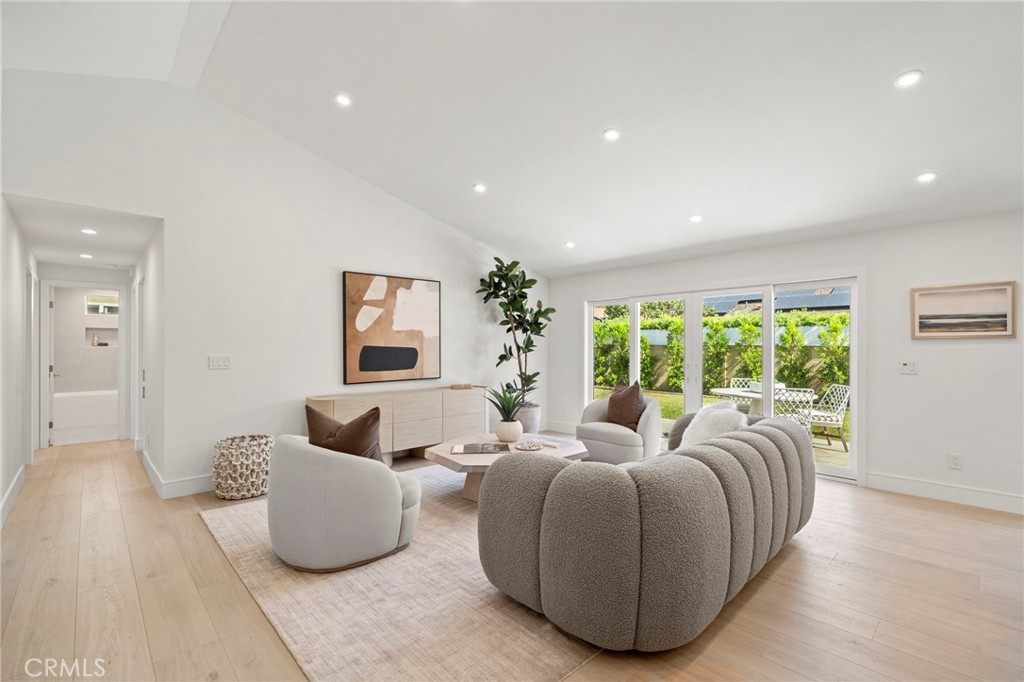 Raised cathedral ceiling with extensive recessed lighting - 20852 Farnsworth Lane, Huntington Beach CA 92646 - photo 4