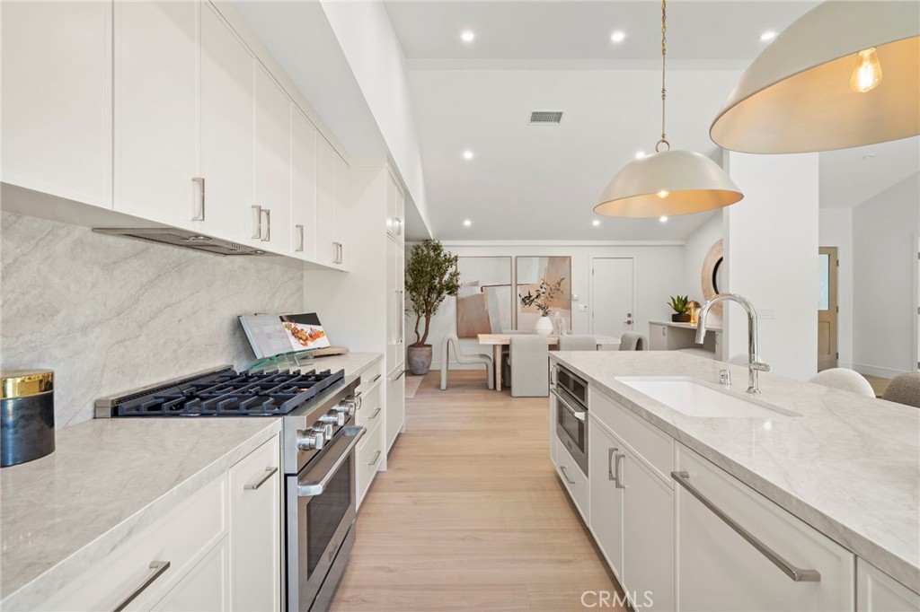Kitchen and dining room - 20852 Farnsworth Lane, Huntington Beach CA 92646 - photo 12