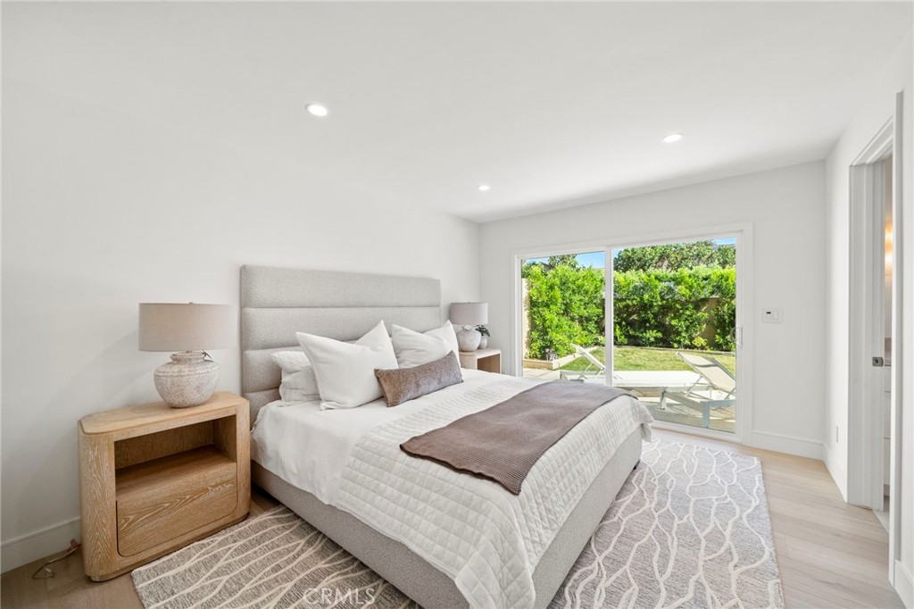 Primary suite with slider opening to backyard - 20852 Farnsworth Lane, Huntington Beach CA 92646 - photo 18