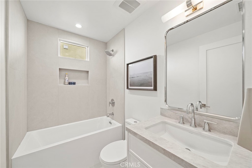 Guest bath - all new with deep soaking tub/shower combo, quartz counters - 20852 Farnsworth Lane, Huntington Beach CA 92646 - photo 27