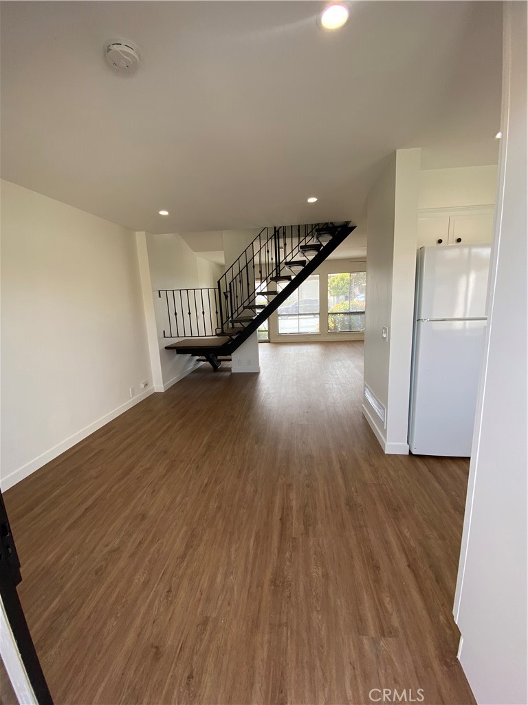 Opposite view of the dining room. - 21292 GREENSPRAY Lane, Huntington Beach CA 92646 - photo 7