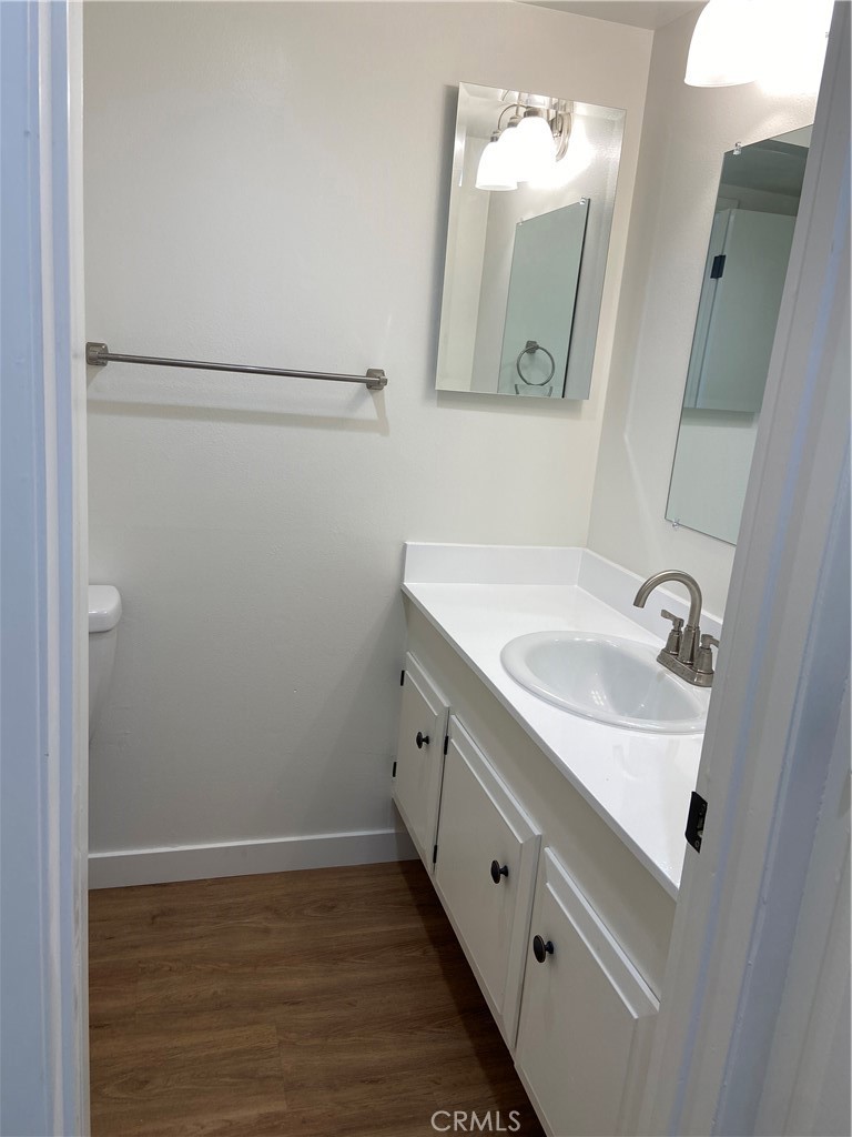 Downstairs half bathroom. Bathroom #3 - 21292 GREENSPRAY Lane, Huntington Beach CA 92646 - photo 18