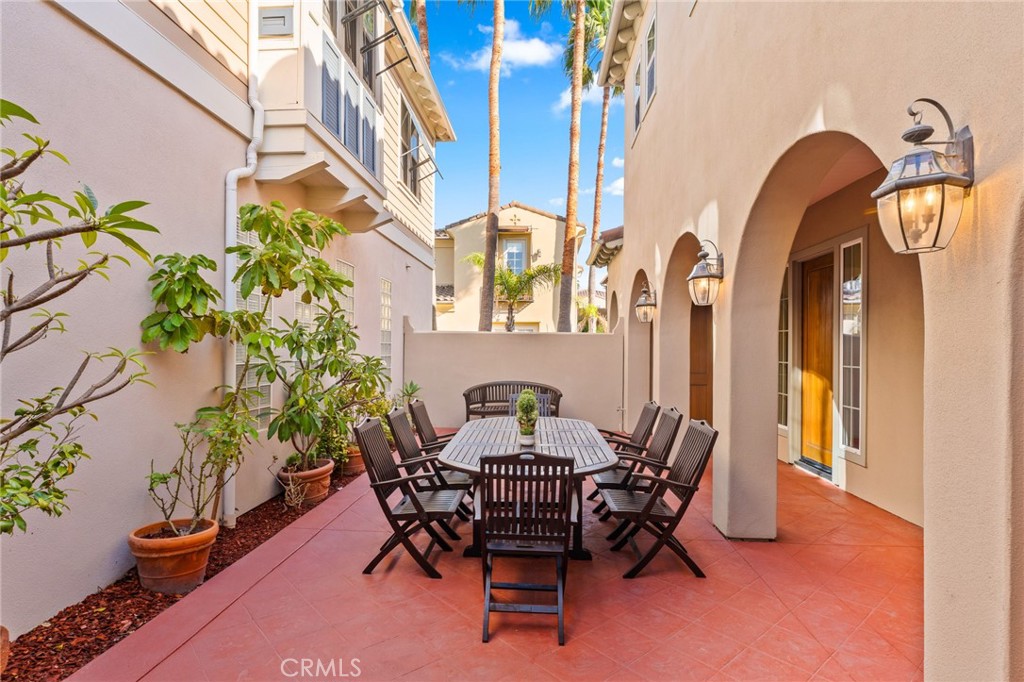 European-style arches, and sconce lighting—an exceptional outdoor living space for relaxing and entertaining. - 21306 Balerma, Huntington Beach CA 92648 - photo 5