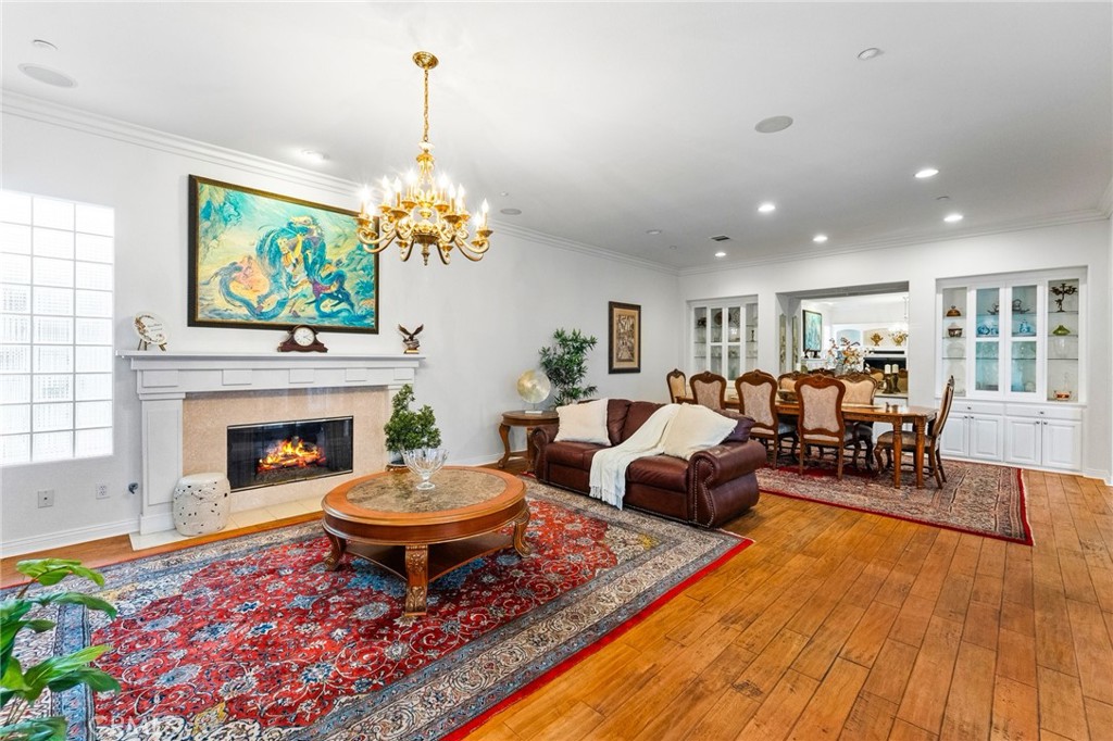 Exquisite upgrades and architectural details abound, including top-of-the-line wide-plank stained maple engineered wood - 21306 Balerma, Huntington Beach CA 92648 - photo 9