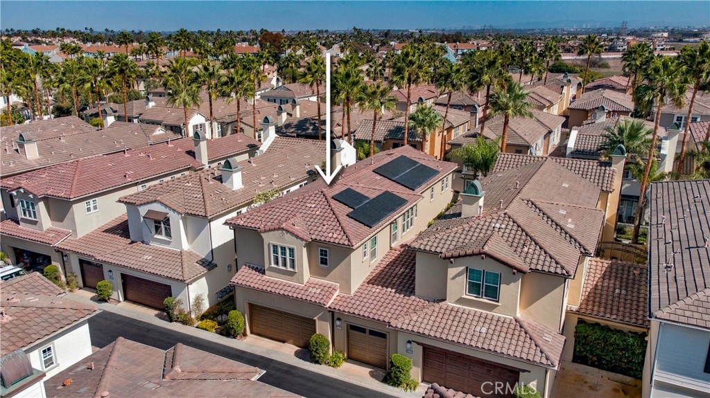 Arial view of back of home with 3-car garage. - 21322 Balerma, Huntington Beach CA 92648 - photo 58