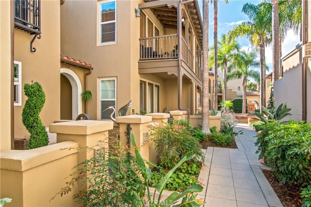 Nestled in a peaceful interior location across from the gated resort pool, spa, showers, BBQ area and cabana. - 21335 Cieza, Huntington Beach CA 92648 - photo 6