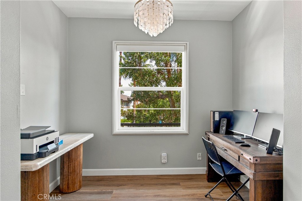 Generous alcove is ideal for a home office, music room, or reading retreat. - 21335 Cieza, Huntington Beach CA 92648 - photo 28