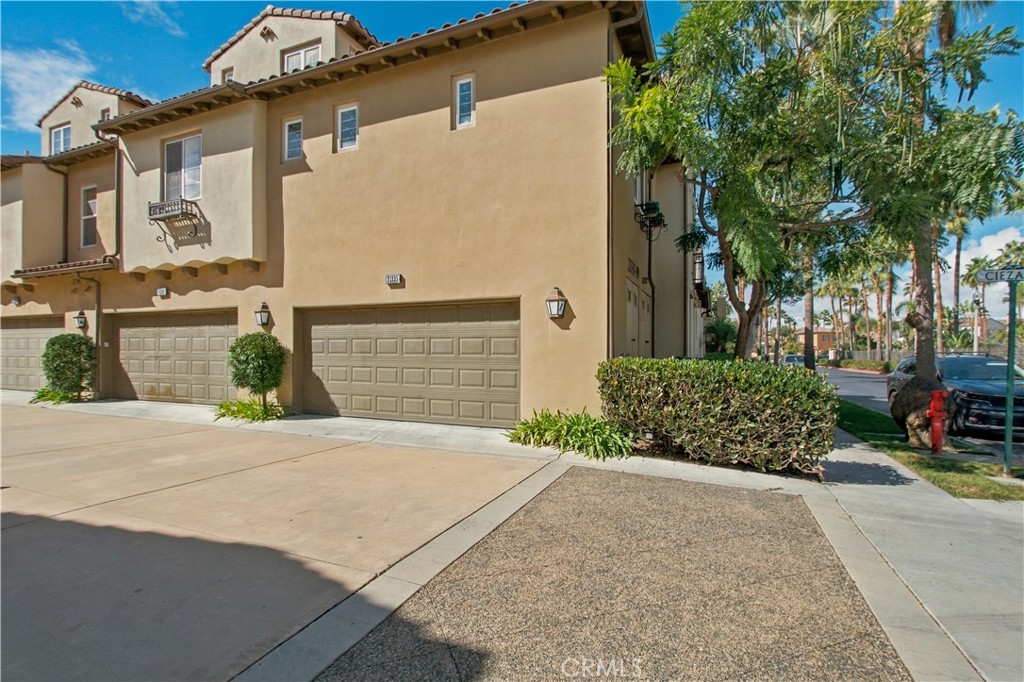 Direct-access two-car garage with epoxy flooring. - 21335 Cieza, Huntington Beach CA 92648 - photo 48