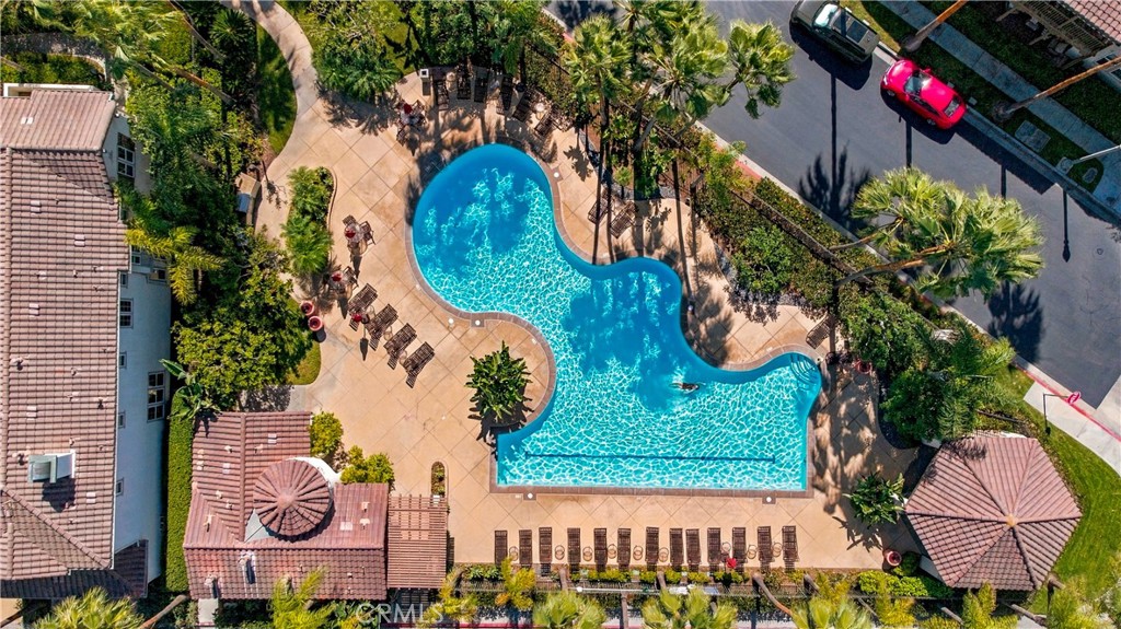 Gated community pool with showers and restrooms. - 21335 Cieza, Huntington Beach CA 92648 - photo 51