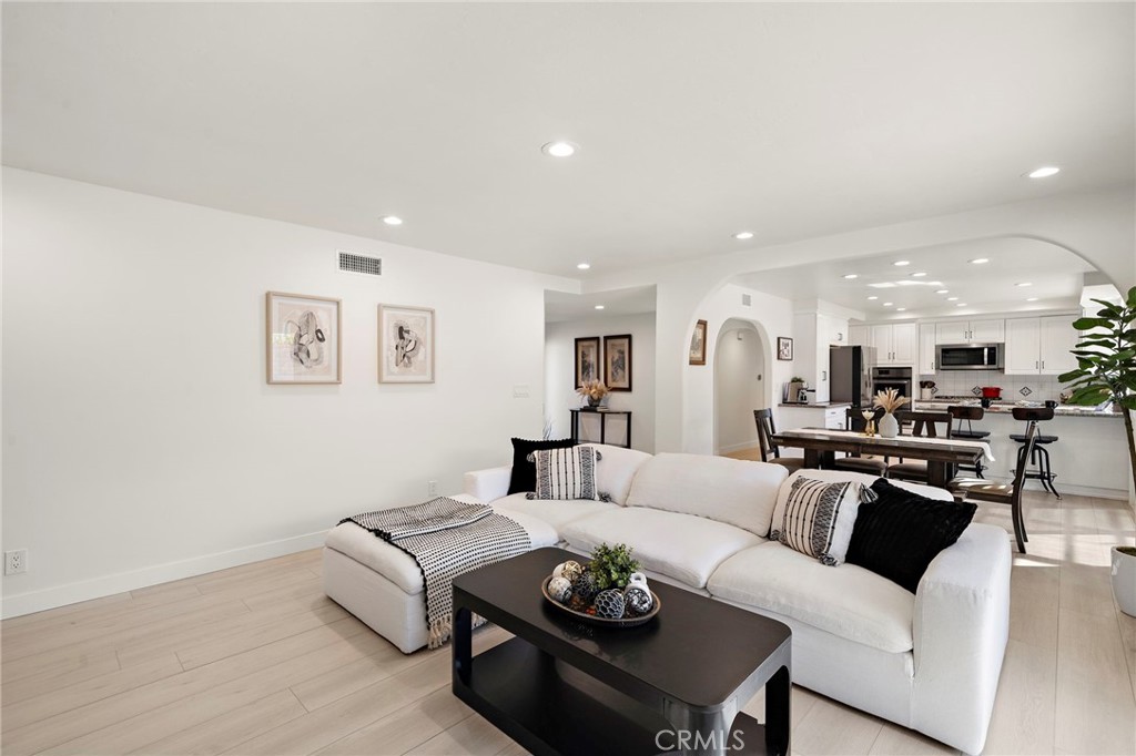 Vinyl plank flooring, recessed lighting, dual-pane windows - 21341 Seaforth Lane, Huntington Beach CA 92646 - photo 6
