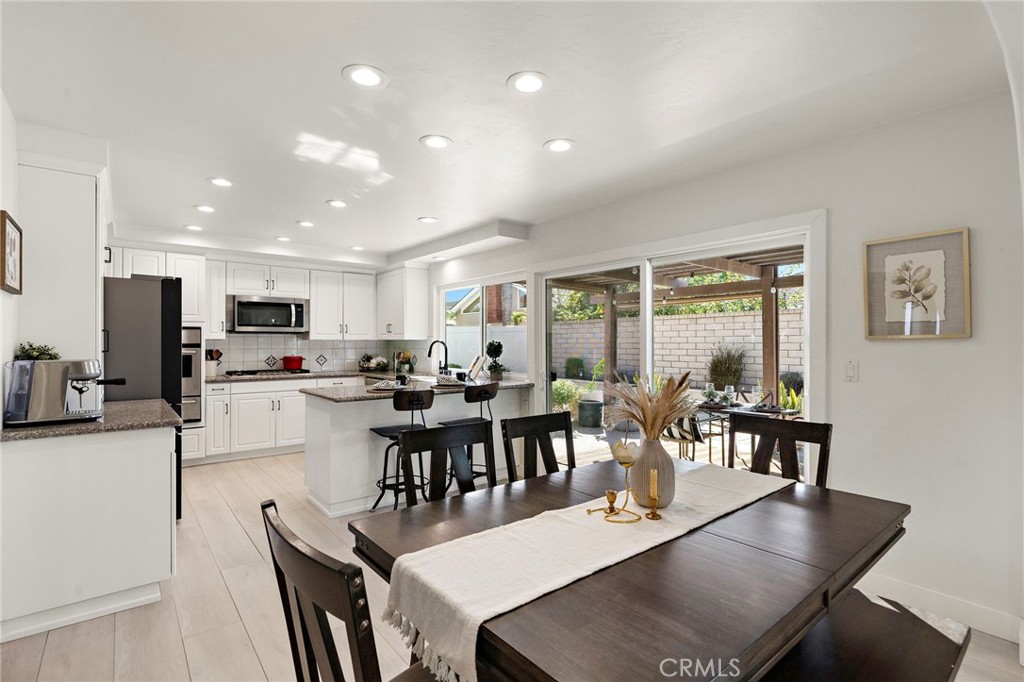 Remodeled kitchen features granite countertops - 21341 Seaforth Lane, Huntington Beach CA 92646 - photo 9