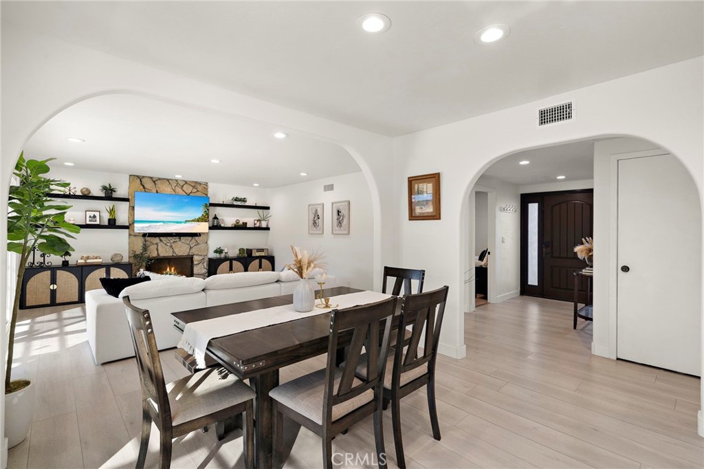White Shaker cabinetry, stainless steel appliances - 21341 Seaforth Lane, Huntington Beach CA 92646 - photo 10