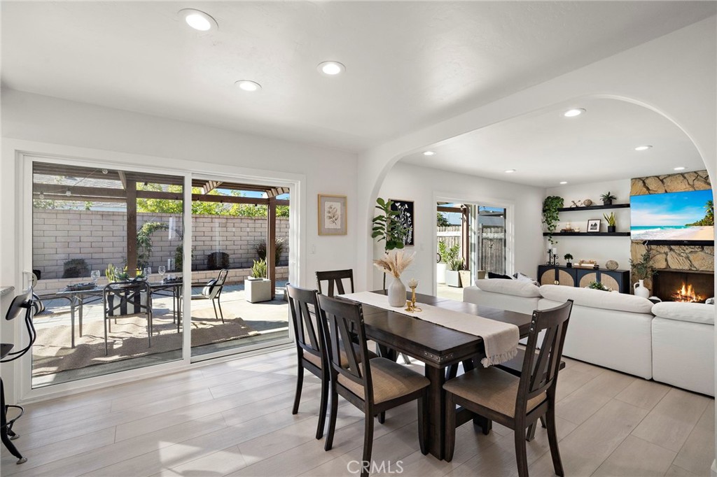 Open concept living dining and kitchen space - 21341 Seaforth Lane, Huntington Beach CA 92646 - photo 11