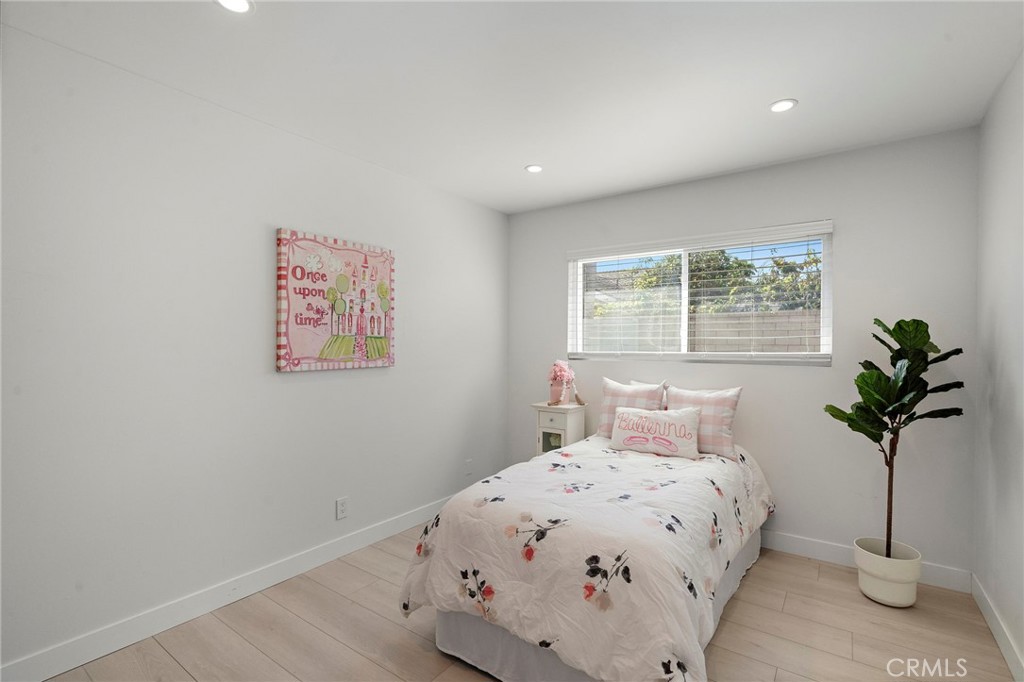 Generously sized econdary bedroom - 21341 Seaforth Lane, Huntington Beach CA 92646 - photo 17