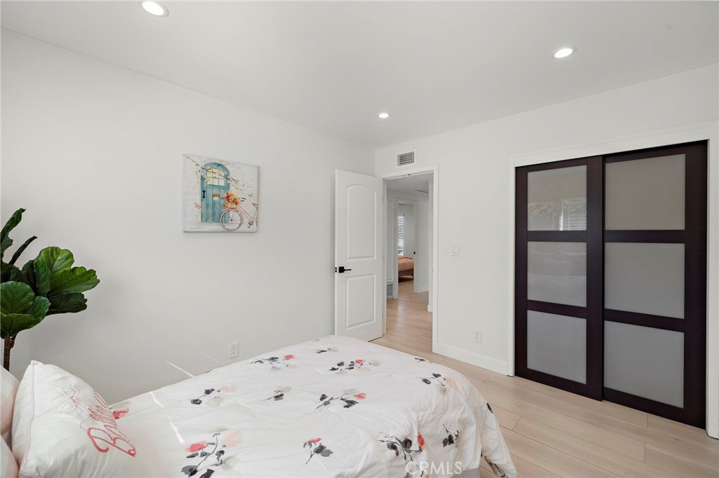 Frosted-glass closet doors - 21341 Seaforth Lane, Huntington Beach CA 92646 - photo 18