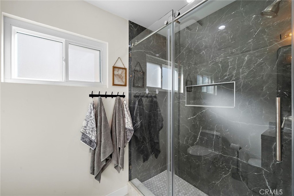 Glass barn-door-style shower enclosures - 21341 Seaforth Lane, Huntington Beach CA 92646 - photo 20