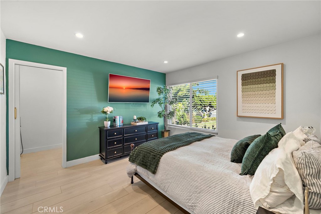 Primary suite with natural light and recessed lighting - 21341 Seaforth Lane, Huntington Beach CA 92646 - photo 26