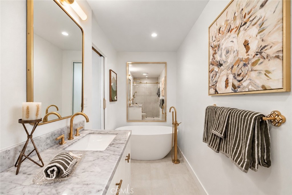 Freestanding soaking tub, separate shower, brass and gold fixtures - 21341 Seaforth Lane, Huntington Beach CA 92646 - photo 29