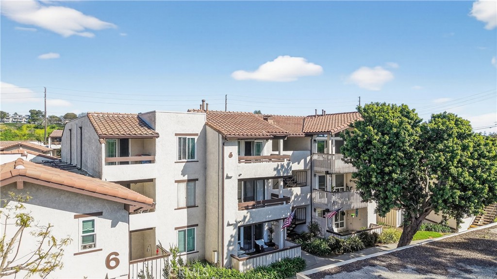 Located within gated community Sea Spray - 21372 Brookhurst 626, Huntington Beach CA 92646 - photo 1