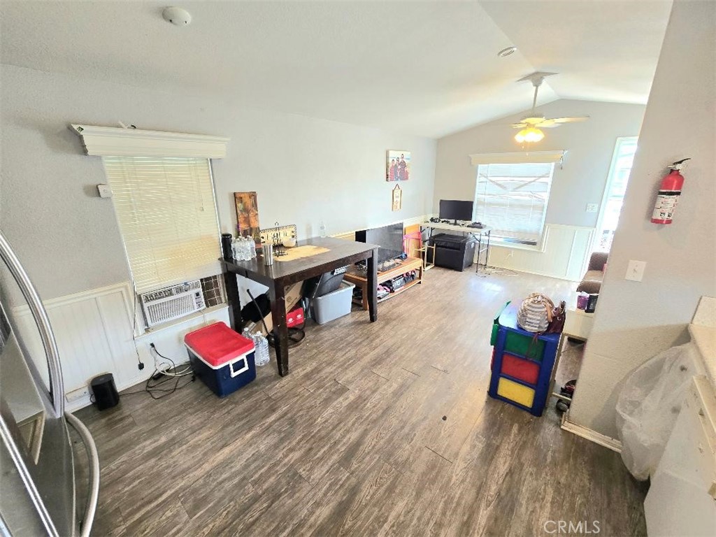 living room / kitchen - 21752 Pacific Coast Hwy 7A, Huntington Beach CA 92646 - photo 7