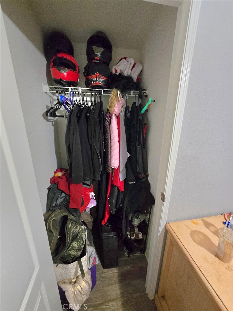 Master closet - 21752 Pacific Coast Hwy 7A, Huntington Beach CA 92646 - photo 11