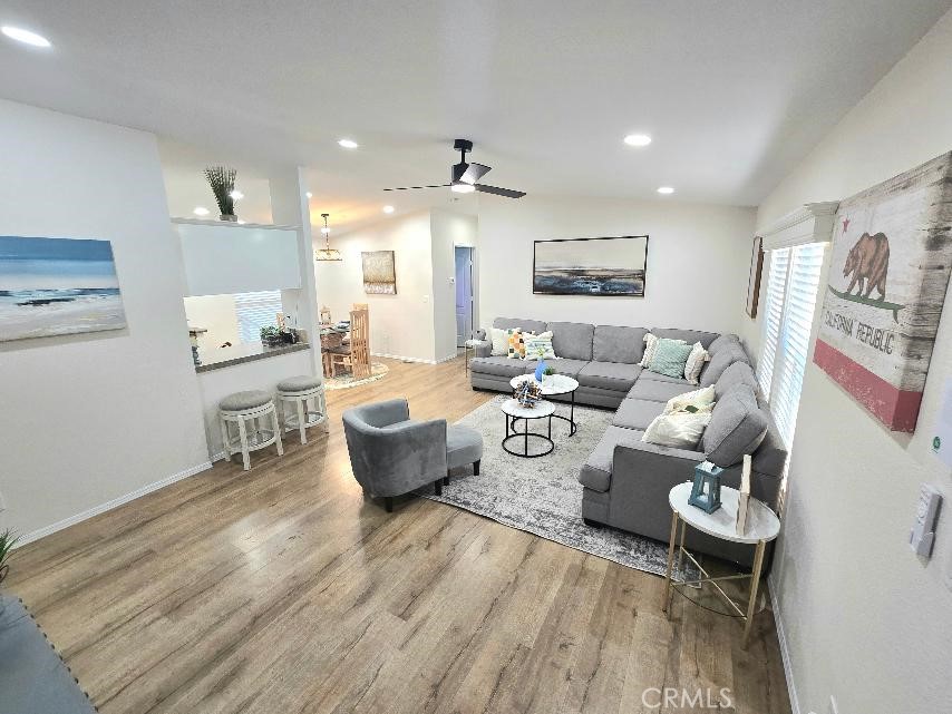 Living room - 21851 Newland St. 43, Huntington Beach CA 92646 - photo 5